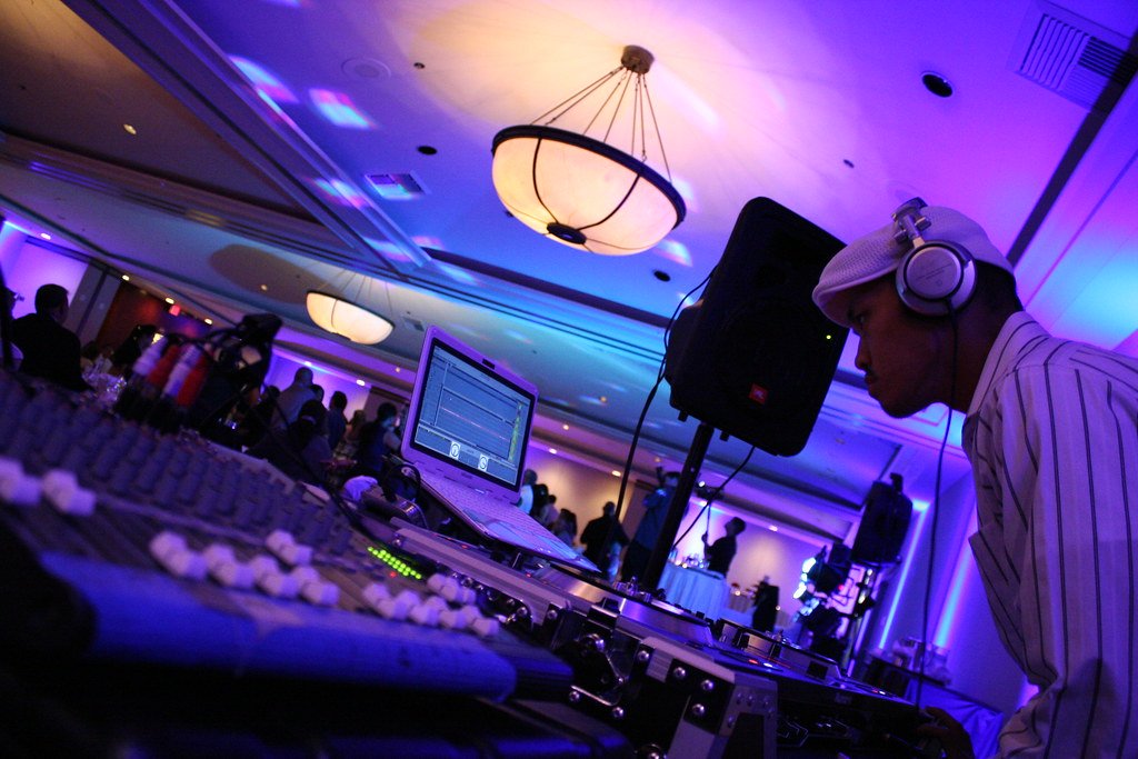 Violet and blue uplighting at a reception